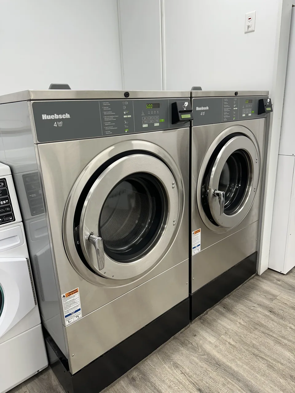 Industrial front-load washers at Spin-It Laundromat