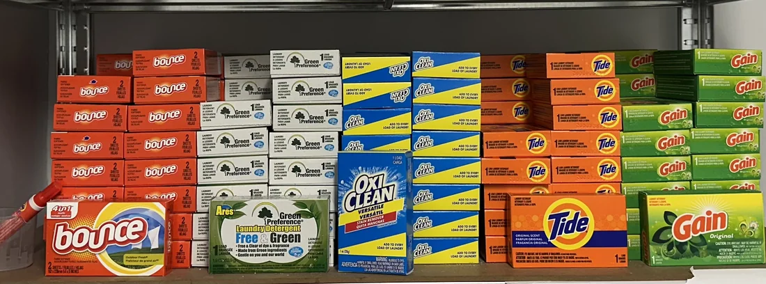 Laundry products for sale at Spin-It Laundromat — Tide, Gain, Bounce, OxiClean and more